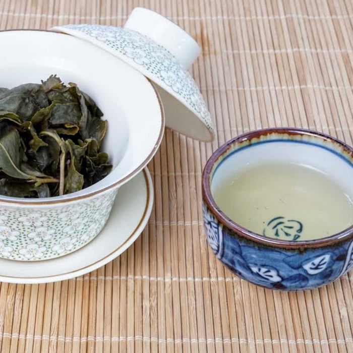 Jade Four Seasons Oolong infused leaves and cup