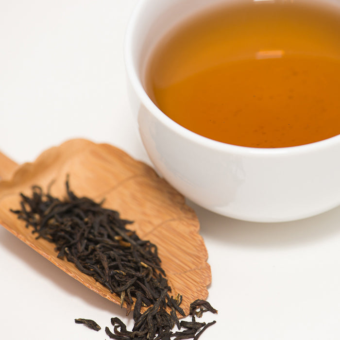 Imperial Organic Earl Grey Tea Leaves and cup of tea