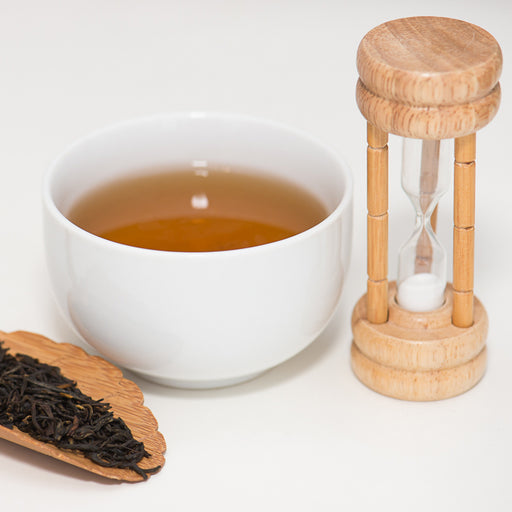 Imperial Organic Earl Grey Tea leaves and cup of tea