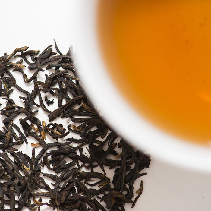 Imperial Organic Earl Grey Tea leaves and cup of tea