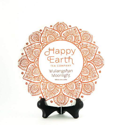 Wuliangshan Moonlight Organic White Tea Cake wrapped