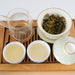Wuliangshan Sheng (raw) organic pu-erh tea on tea tray