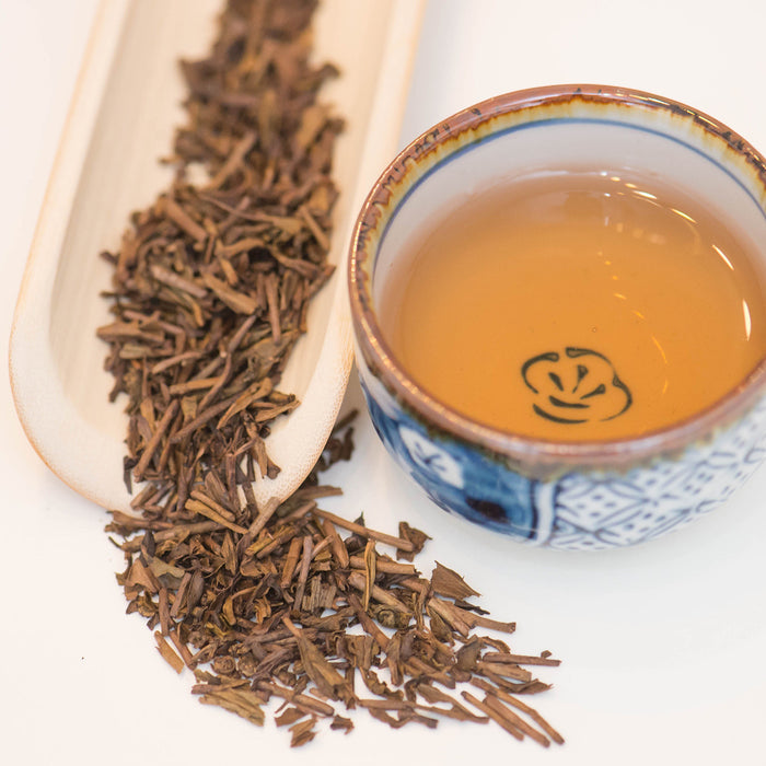 Houjicha - Roasted Organic Japanese Green Tea Leaves and cup of tea