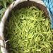 Anji Bai Cha green tea leaf in the basket